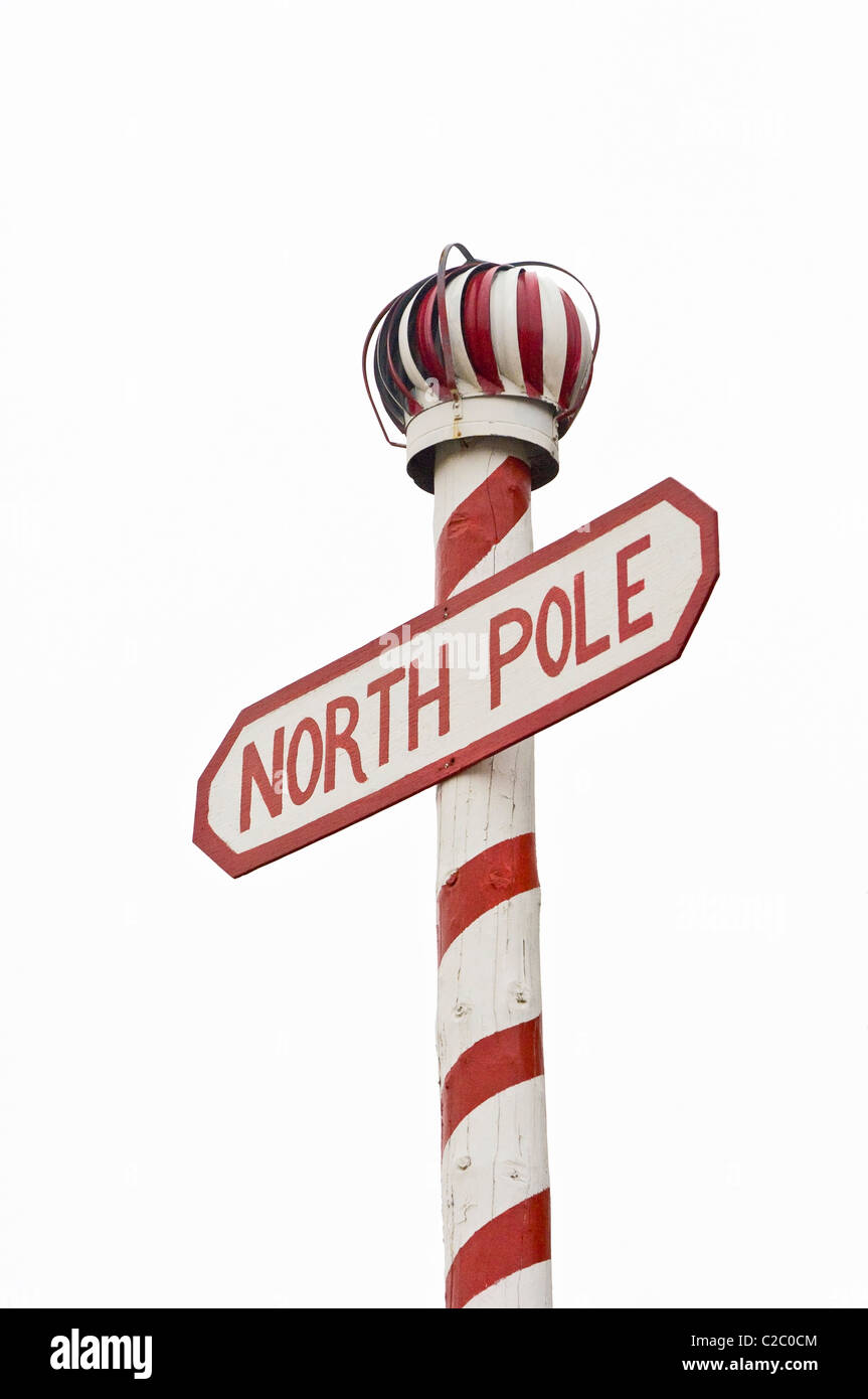 North Pole Sign decorated with a peppermint candy cane stripe motif at Santa's house in North Pole, Alaska. Stock Photo