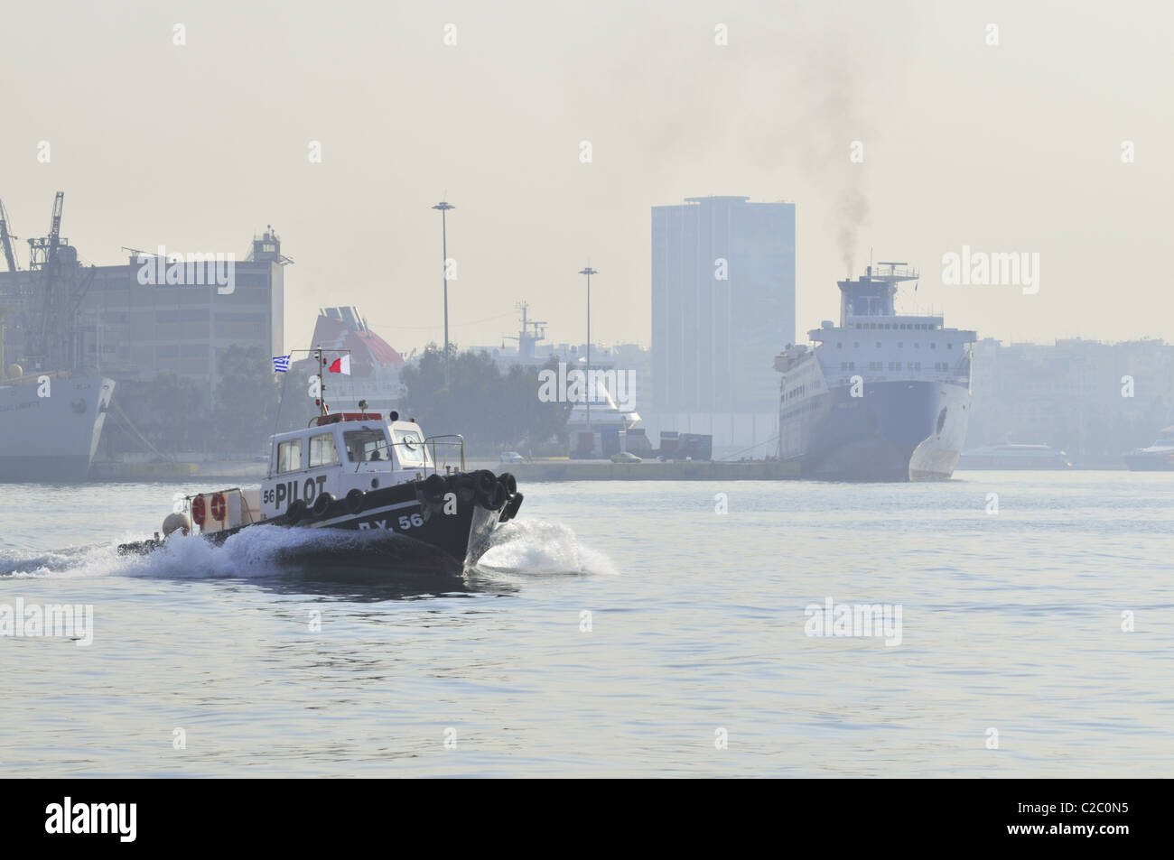 pilot boat in port of Piraeus Stock Photo