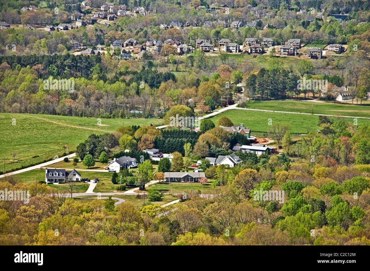 Distant areal view of houses in a suburban landscape. Stock Photo