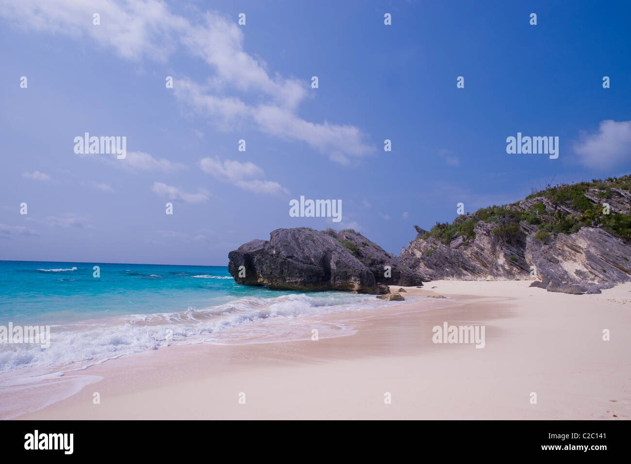 Pink sand beach and rocky outcroppings, South Coast, Warwick Parish, Bermuda. Stock Photo