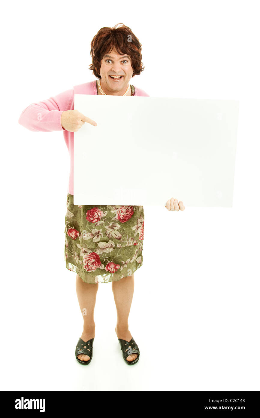 Humorous photo of a man dressed as a woman, holding a blank sign. Isolated on white. Stock Photo