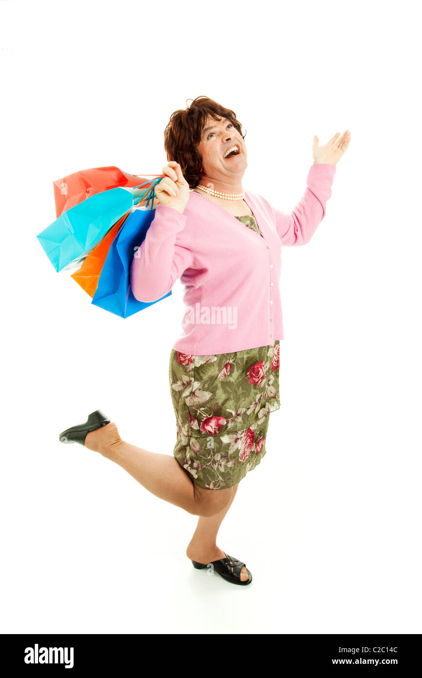 Funny picture of a female impersonator having a great time shopping. Isolated on white.  Stock Photo