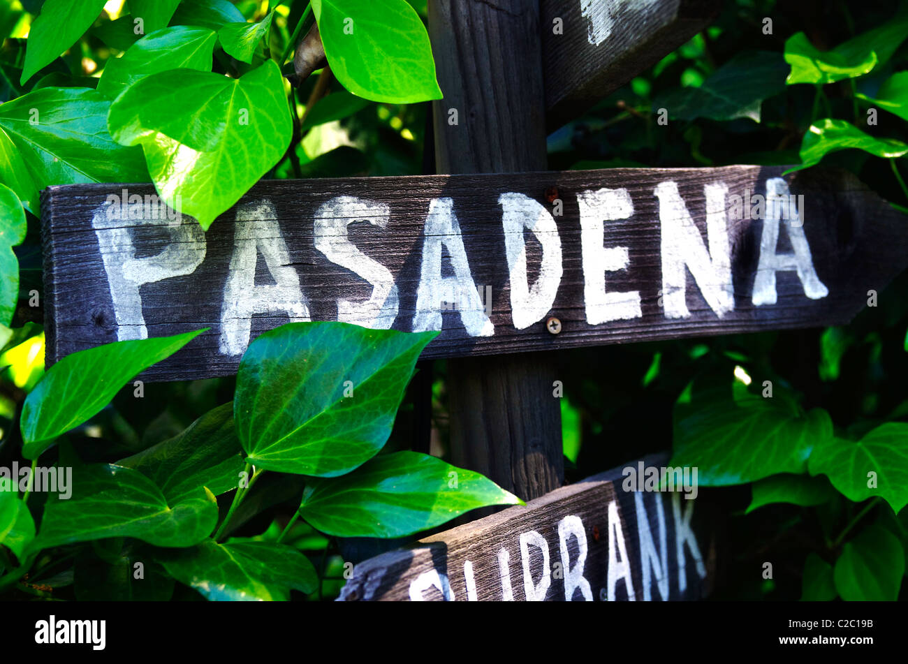 Wooden sign pointing towards Pasadena, California. Stock Photo