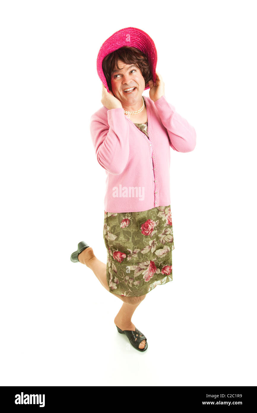 Humorous photo of a man dressed as a woman. Full body, isolated on white.  Stock Photo