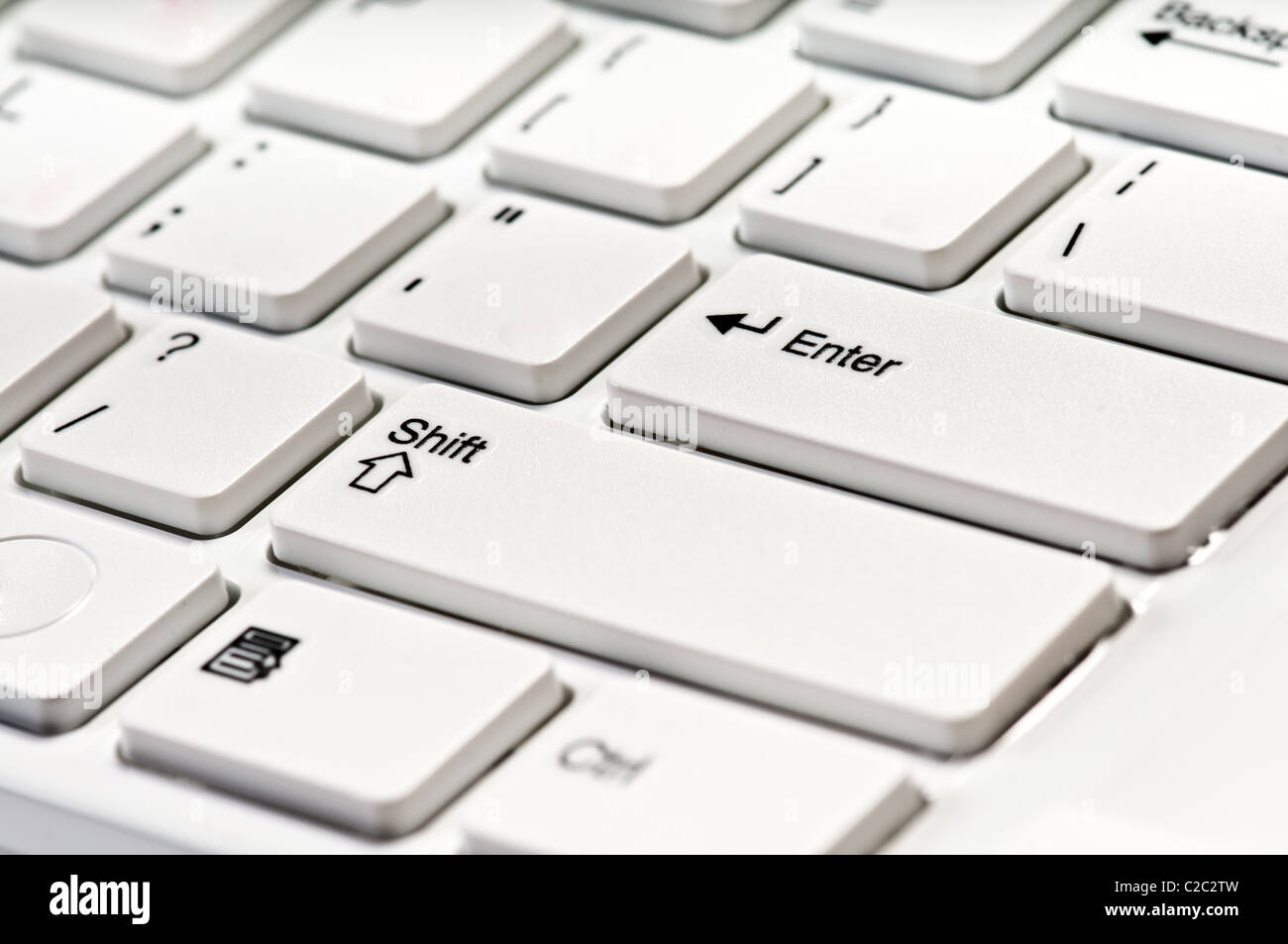 Part of computer keyboard on white Stock Photo