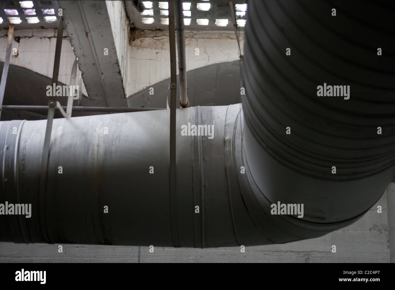 Pipes in the underground garage Stock Photo Alamy