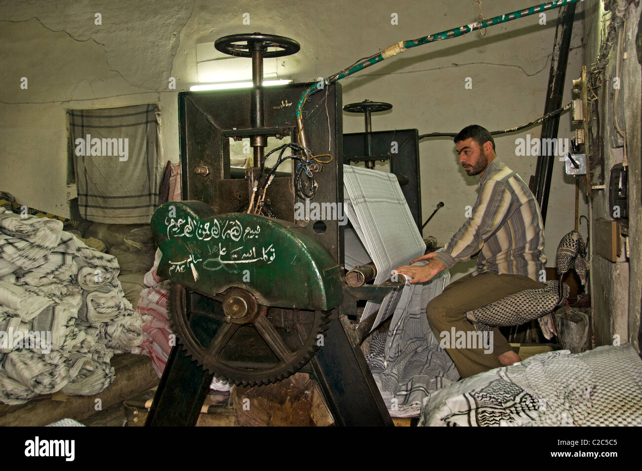 Damascus Syria Bazaar Souk Souq market shop laundry dry cleaning press shop Stock Photo