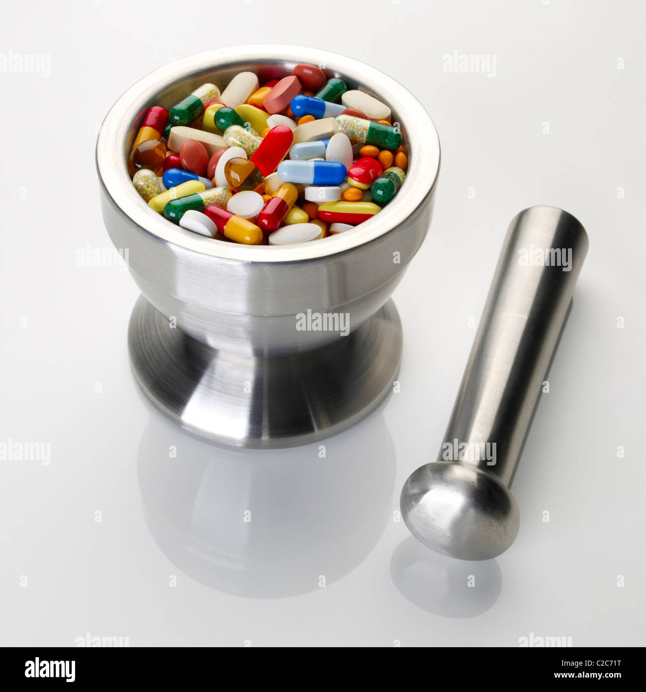 stainless steel mortar and pestle with pills Stock Photo Alamy