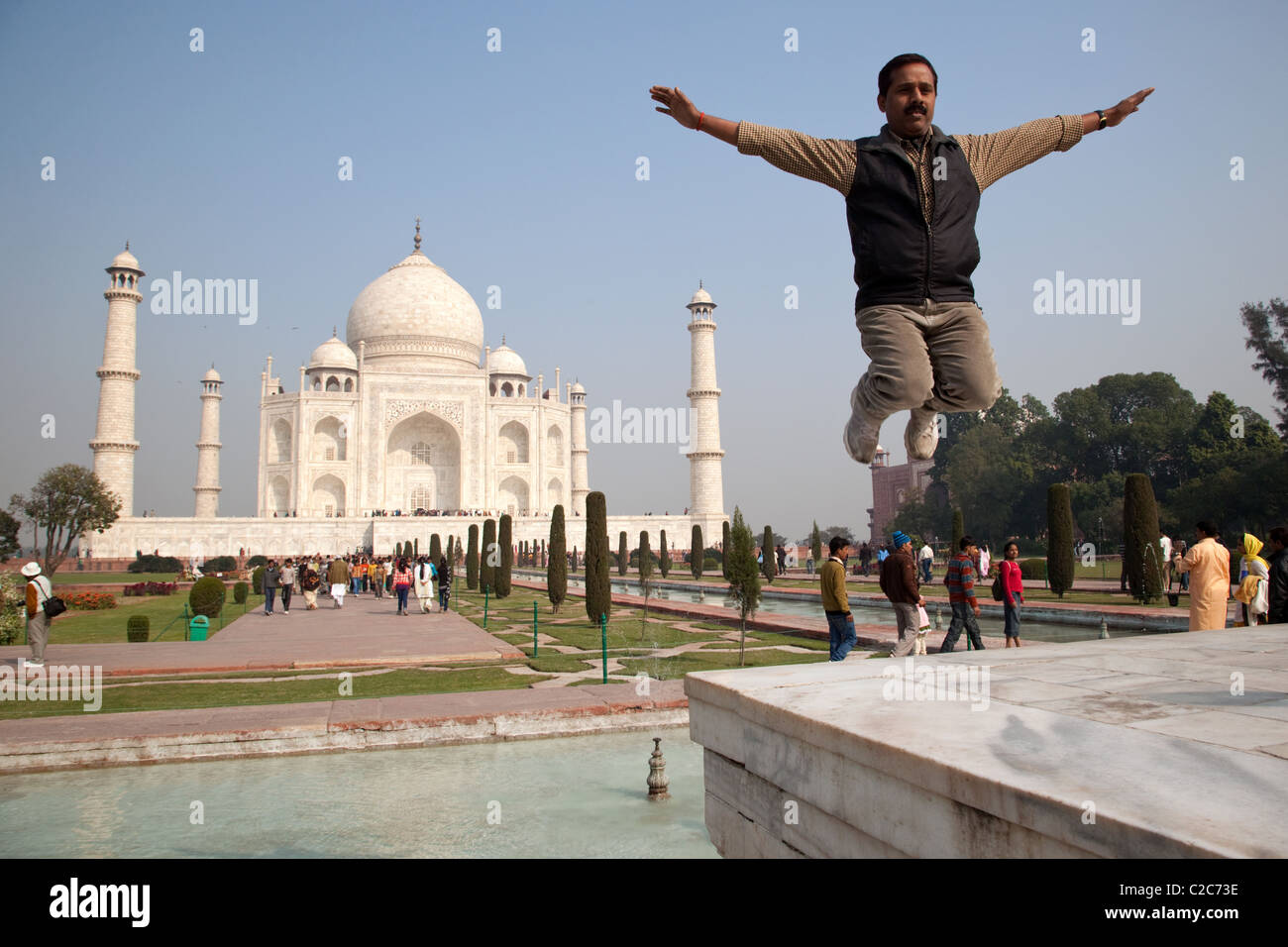 An Indian visitor jumps for a photo in front of Taj Mahal in Agra, India Stock Photo - Alamy An Indian visitor jumps for a photo in front of Taj Mahal in Agra, India Stock Photo - Alamy