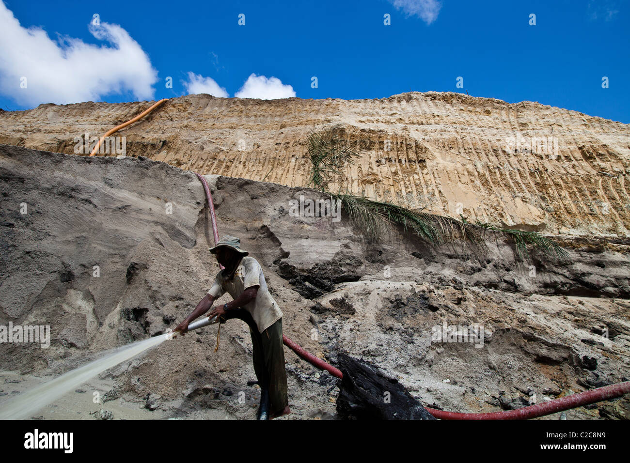 Gold mining in Amazon rain forest Brazil highpressure jets of water to dislodge rock material