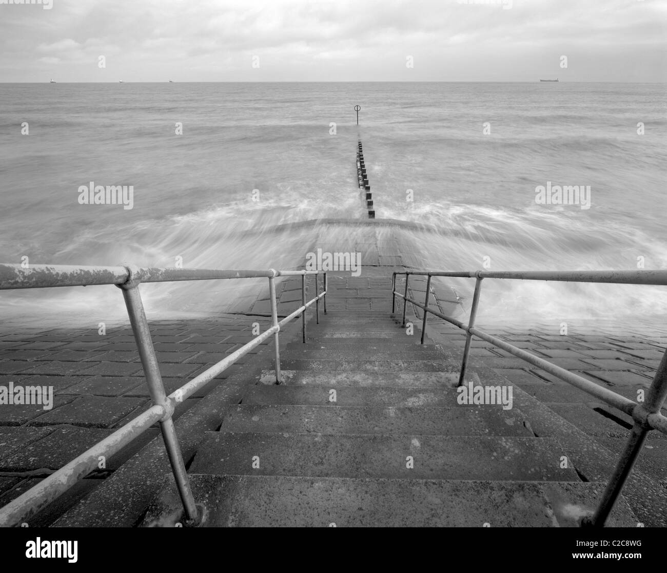 Waves over concrete embankment - Aberdeen beach esplanade - Aberdeen - Scotland - UK Stock Photo