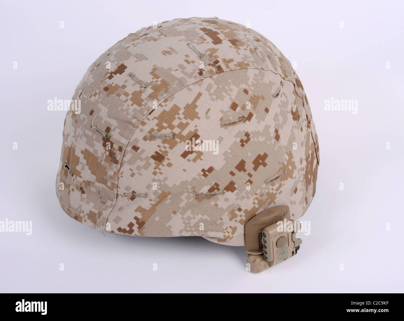 The modern USMC Marine Coprs Lightweight Combat Helmet LWH with Desert MARPAT Marine Pattern camouflage cover with IR lamp Stock Photo