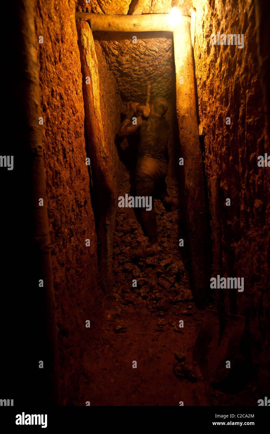 Hard rock mining in Amazon rain forest. Underground mining, where the ore is extracted through tunnels and shafts. Stock Photo