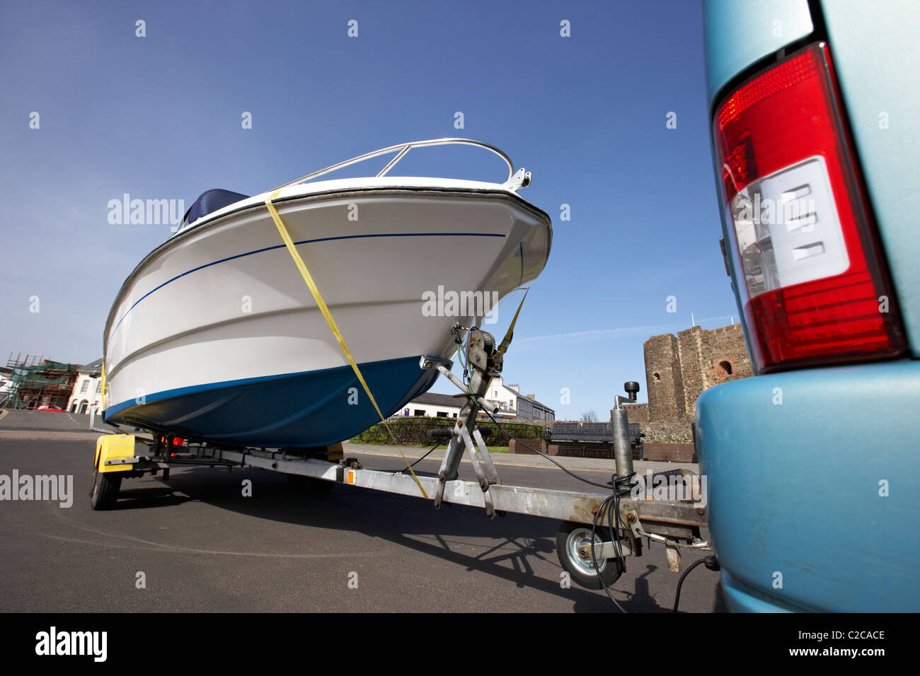 low angle view of car towing boat on trailer in the uk Stock Photo