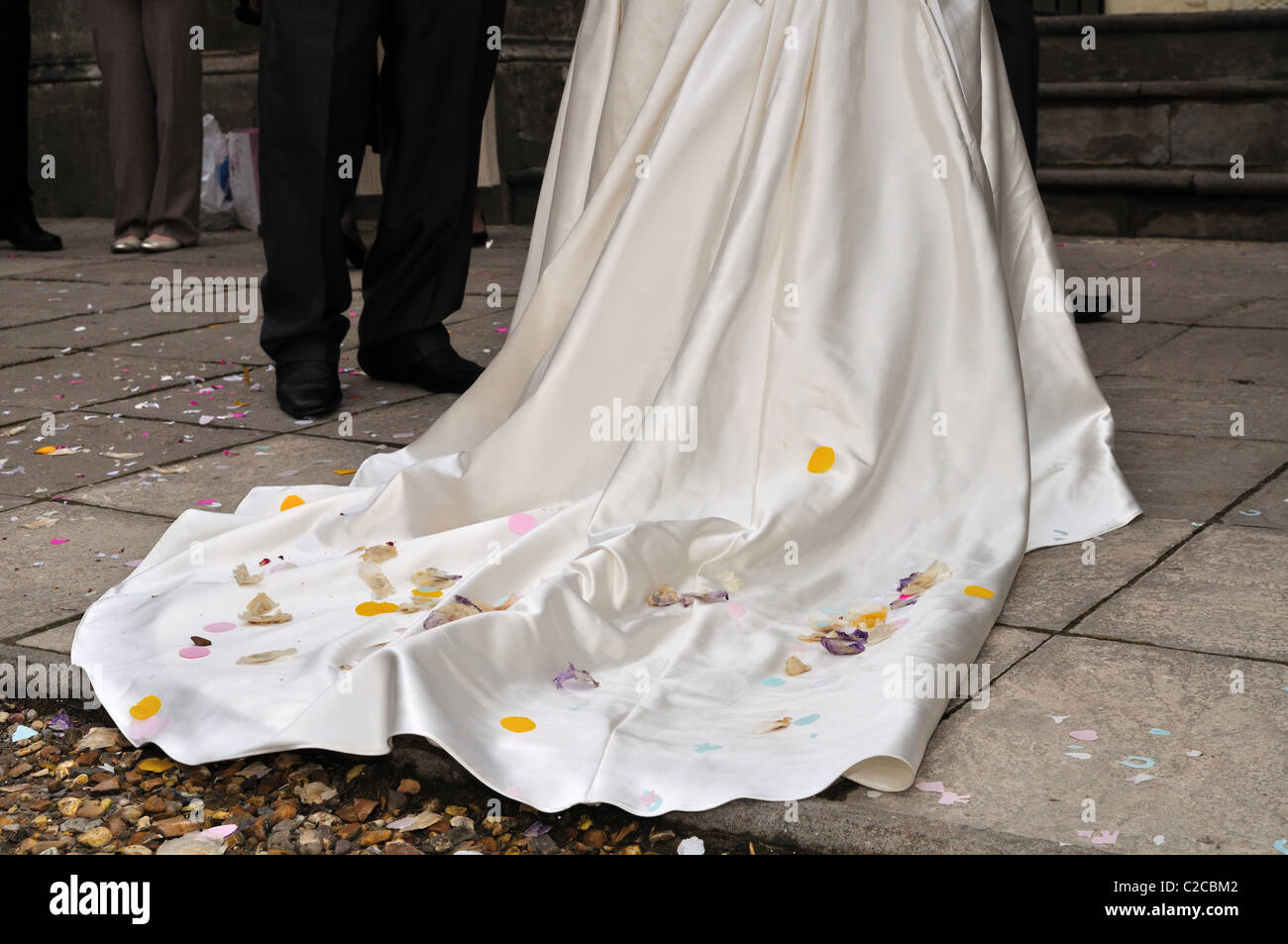 Wedding Dress Train With Confetti Stock Photo - Alamy
