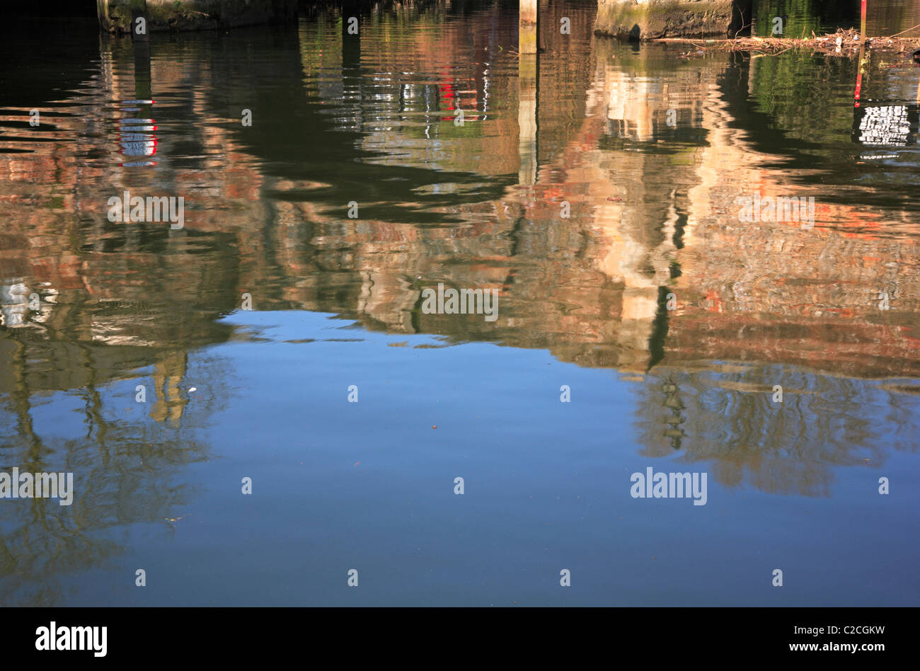 A reflection of the medieval Bishops Bridge in the River Wensum at