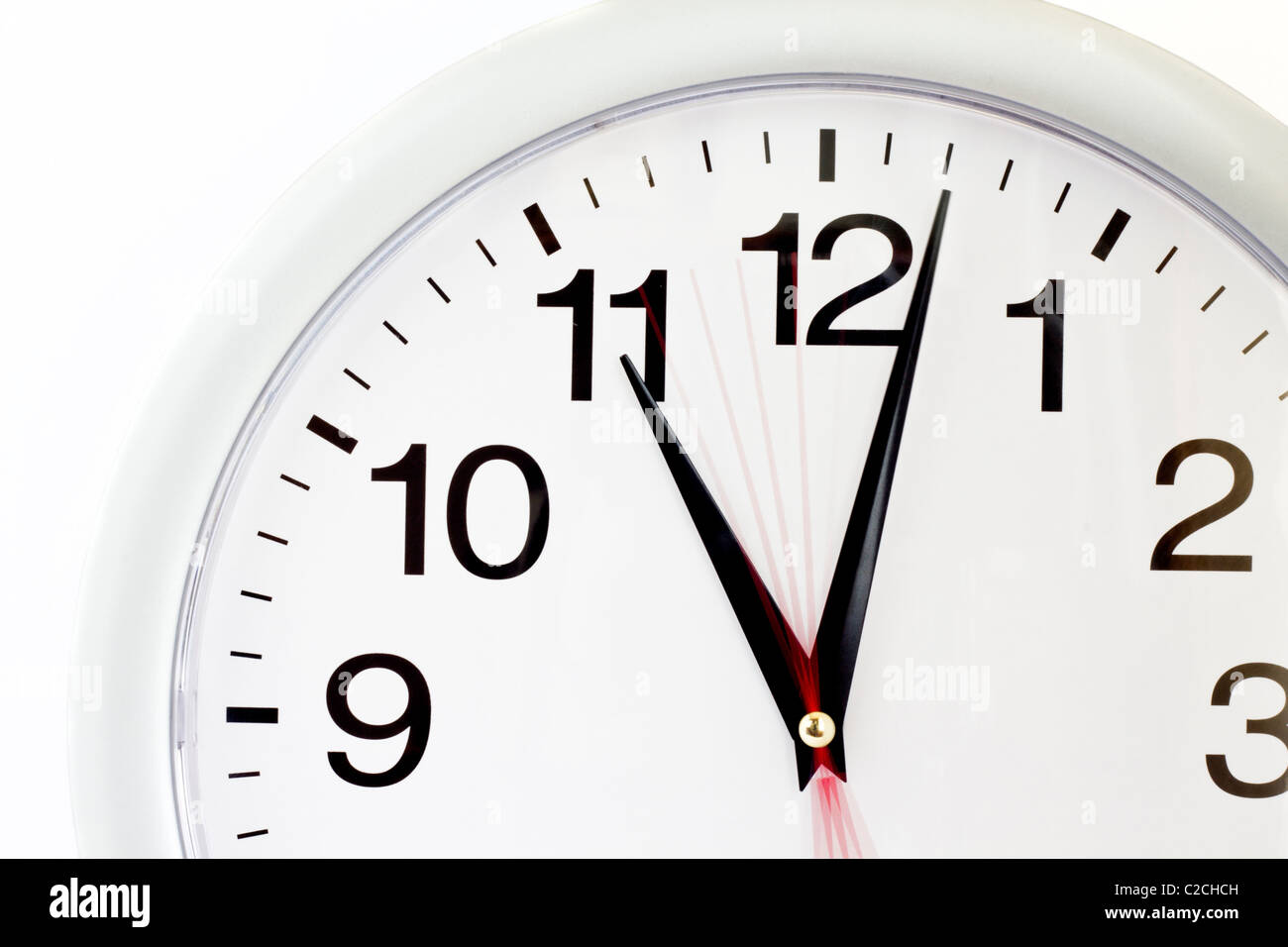 Photo showing the passing of 5 seconds on a wall clock Stock Photo