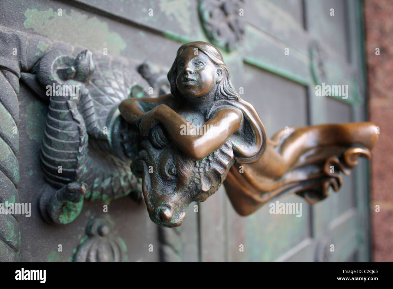 Beautiful handle on door of church in Denmark Stock Photo