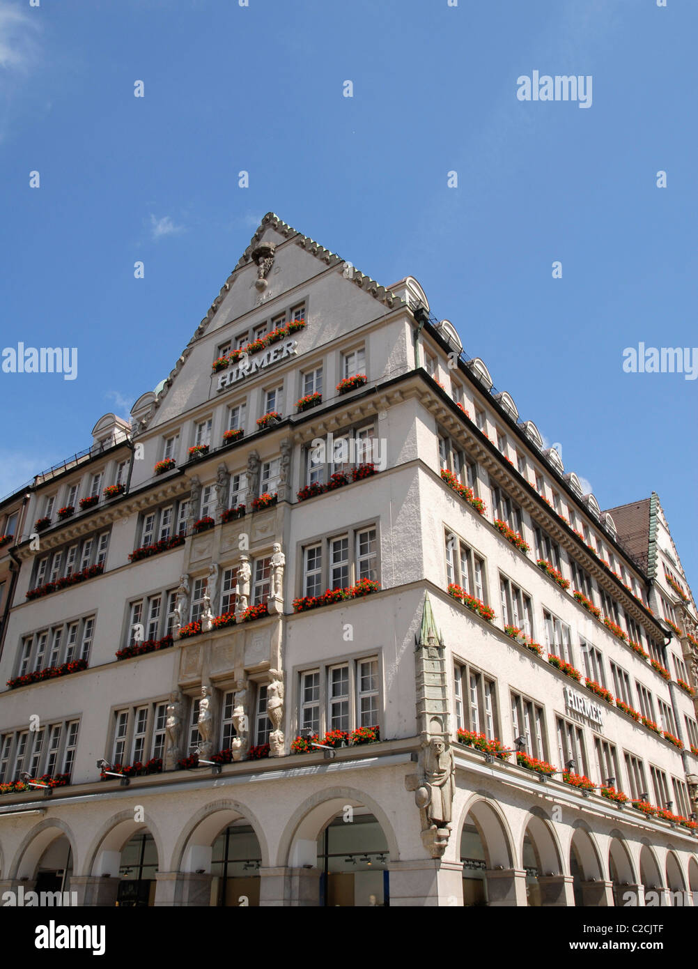Hirmer house an cathedral, munich, germany Stock Photo