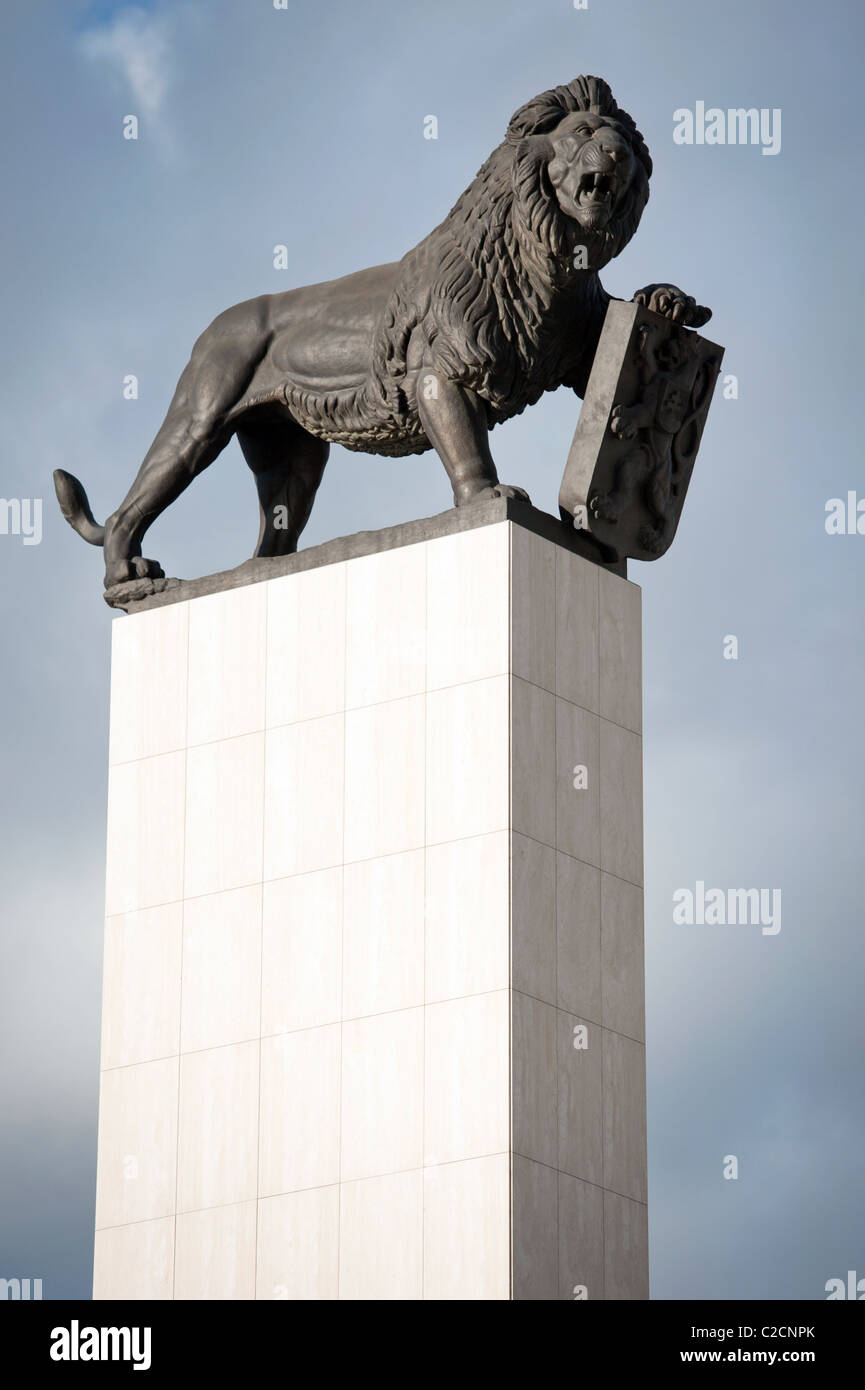 statue of huge bronze lion holding Czechoslovakia symbol, Bratislava, Slovakia Stock Photo