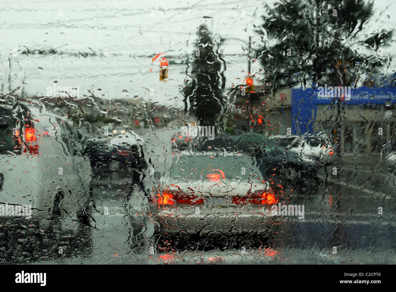 View at traffic through a windshield without wipers during the rain Stock Photo Alamy