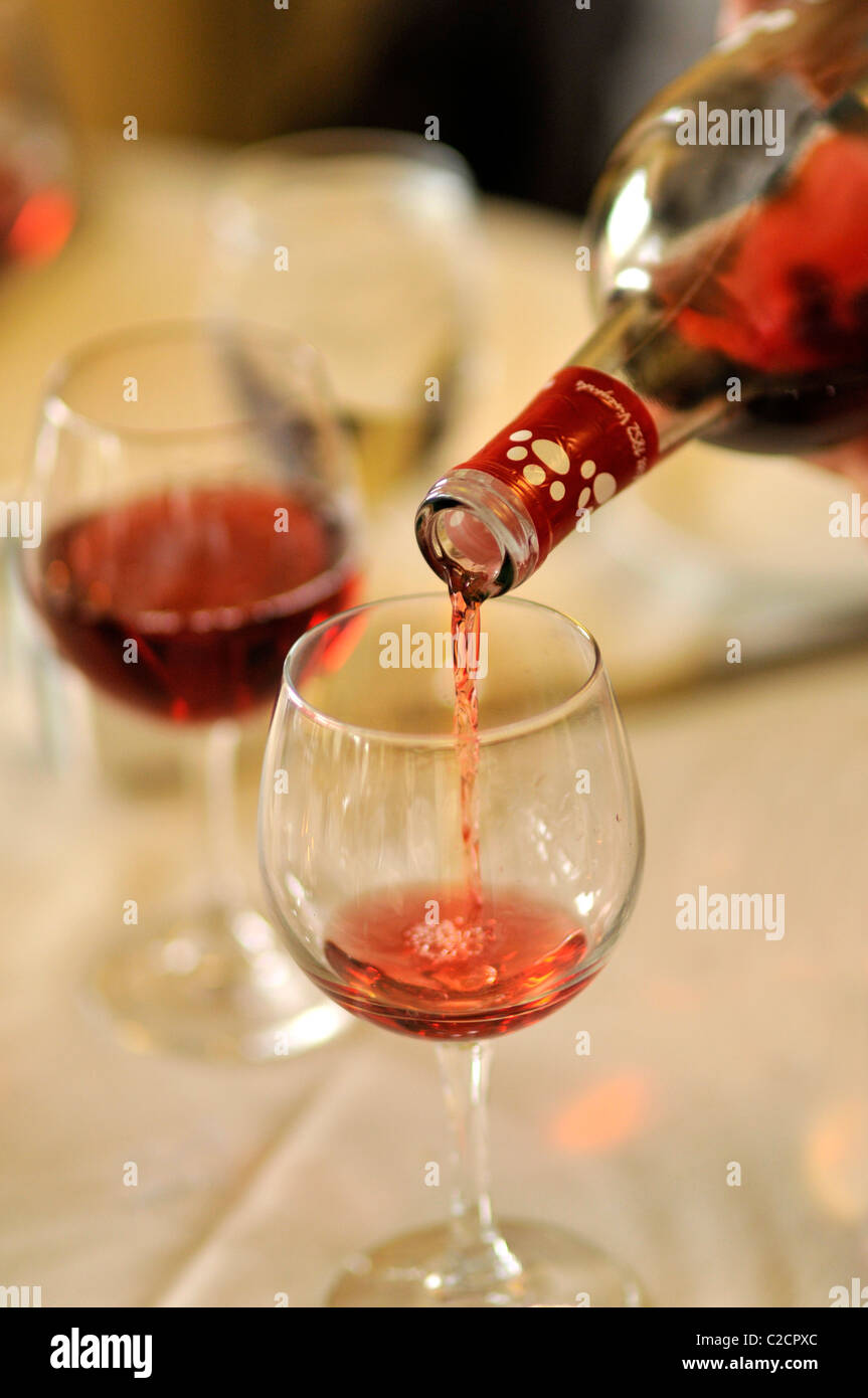 Pouring wine at wedding Stock Photo Alamy