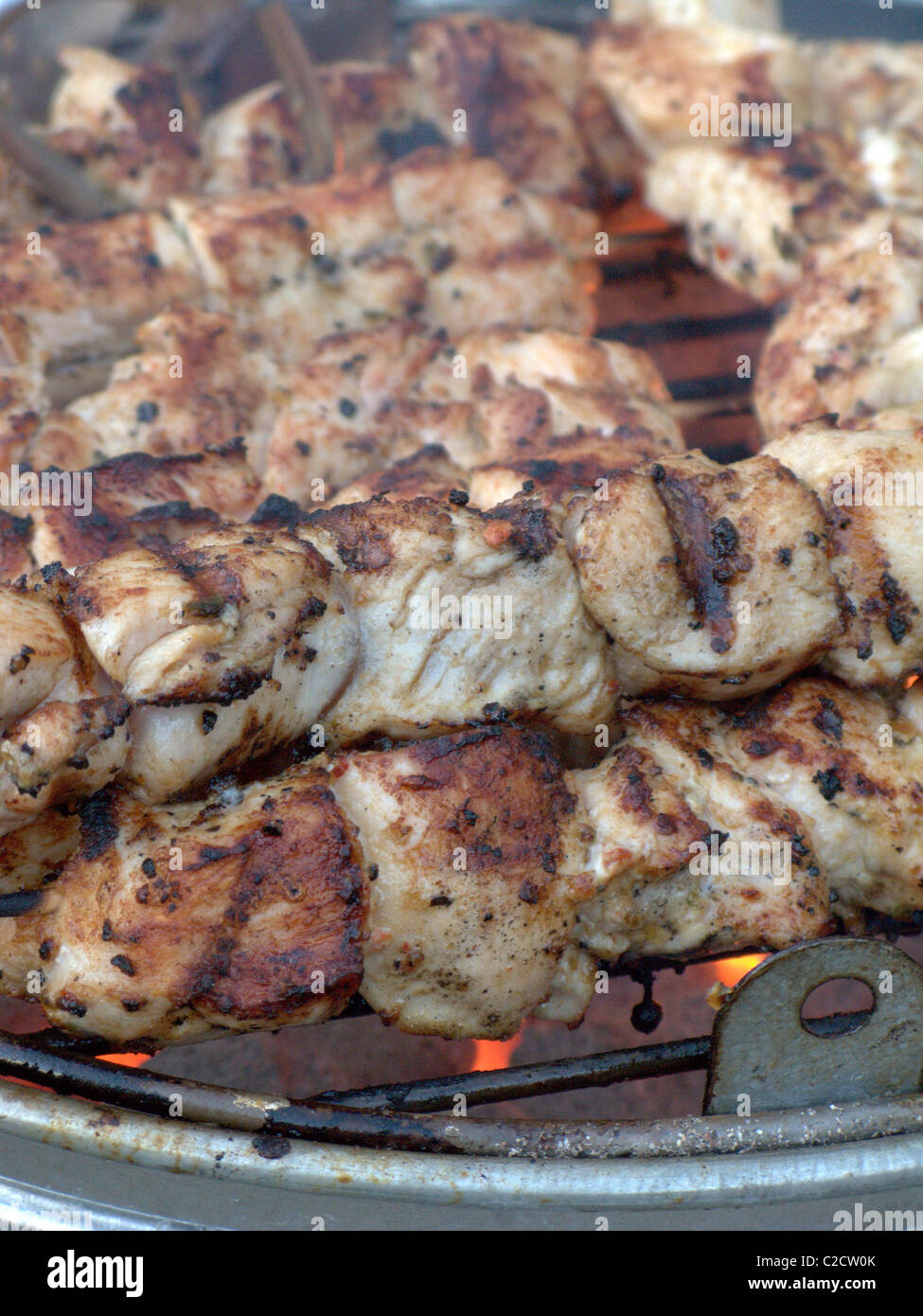 Grilling Chicken Skewers on a barbecue Stock Photo Alamy