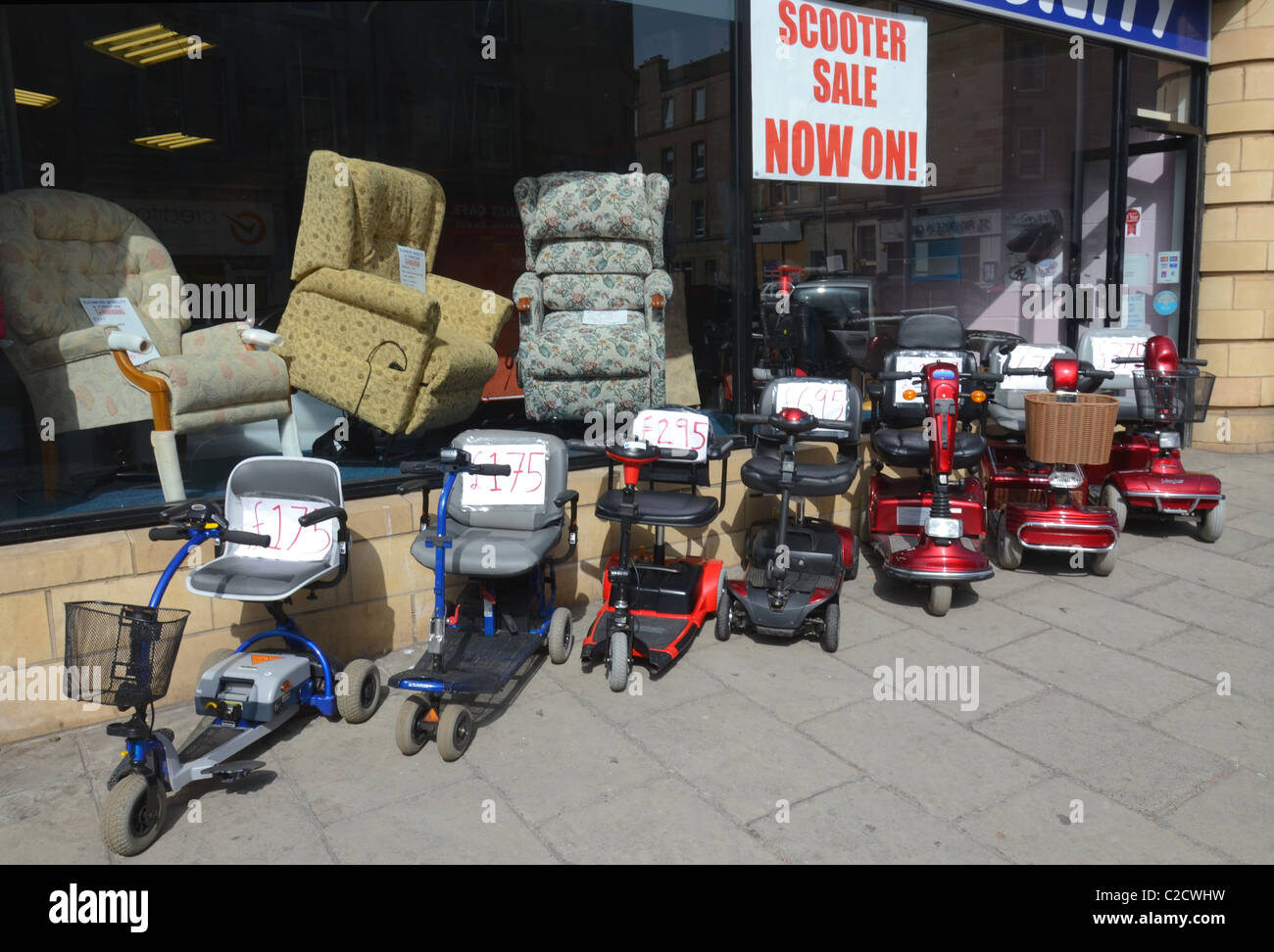 Mobility scooters for sale in Dalry Road, Edinburgh, Scotland, UK. Stock Photo