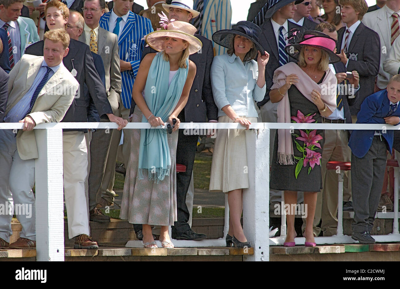 Fashionable people watch rowing races at Henley Royal Regatta on the River Thames, England, UK Stock Photo