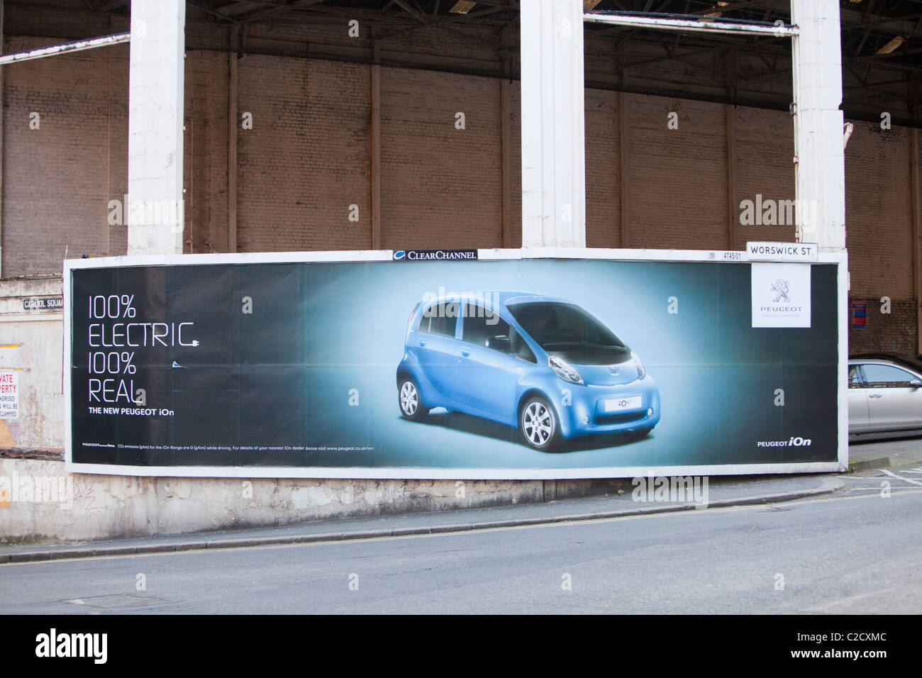 An advert for an electric car on a bill board in Newcastle, UK. Stock Photo