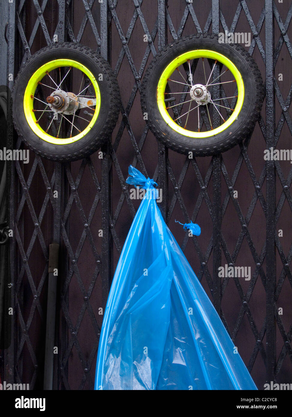 bike tires on gate Stock Photo