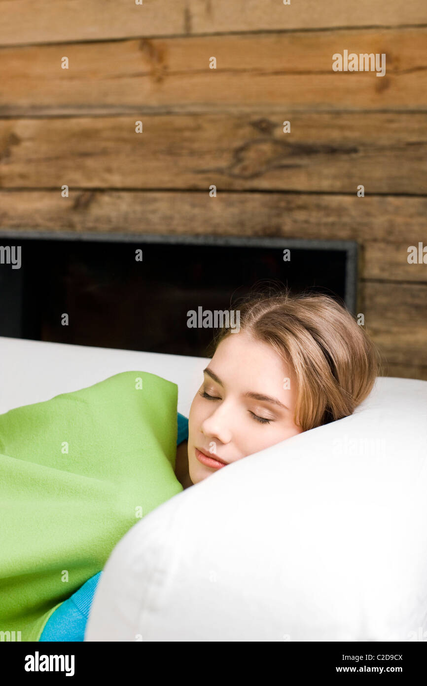 woman sleeping on sofa Stock Photo Alamy