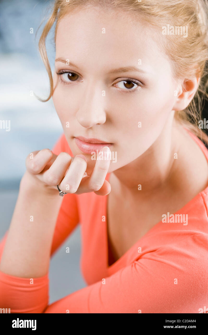 Woman applying ointment for cold sores Stock Photo