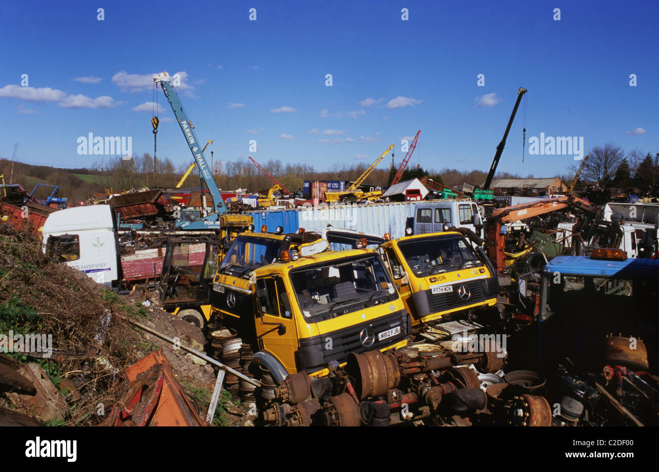 lorries and scrapmetal in scrapyard uk Stock Photo