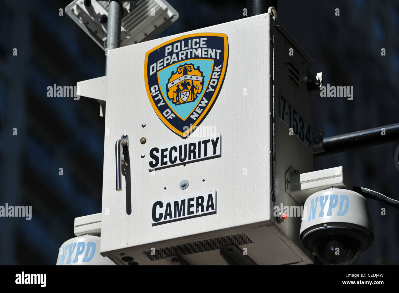 A New York Police Department Close Circuit Television Camera situated on a lamp post at Central Park South, New York City, USA. Stock Photo