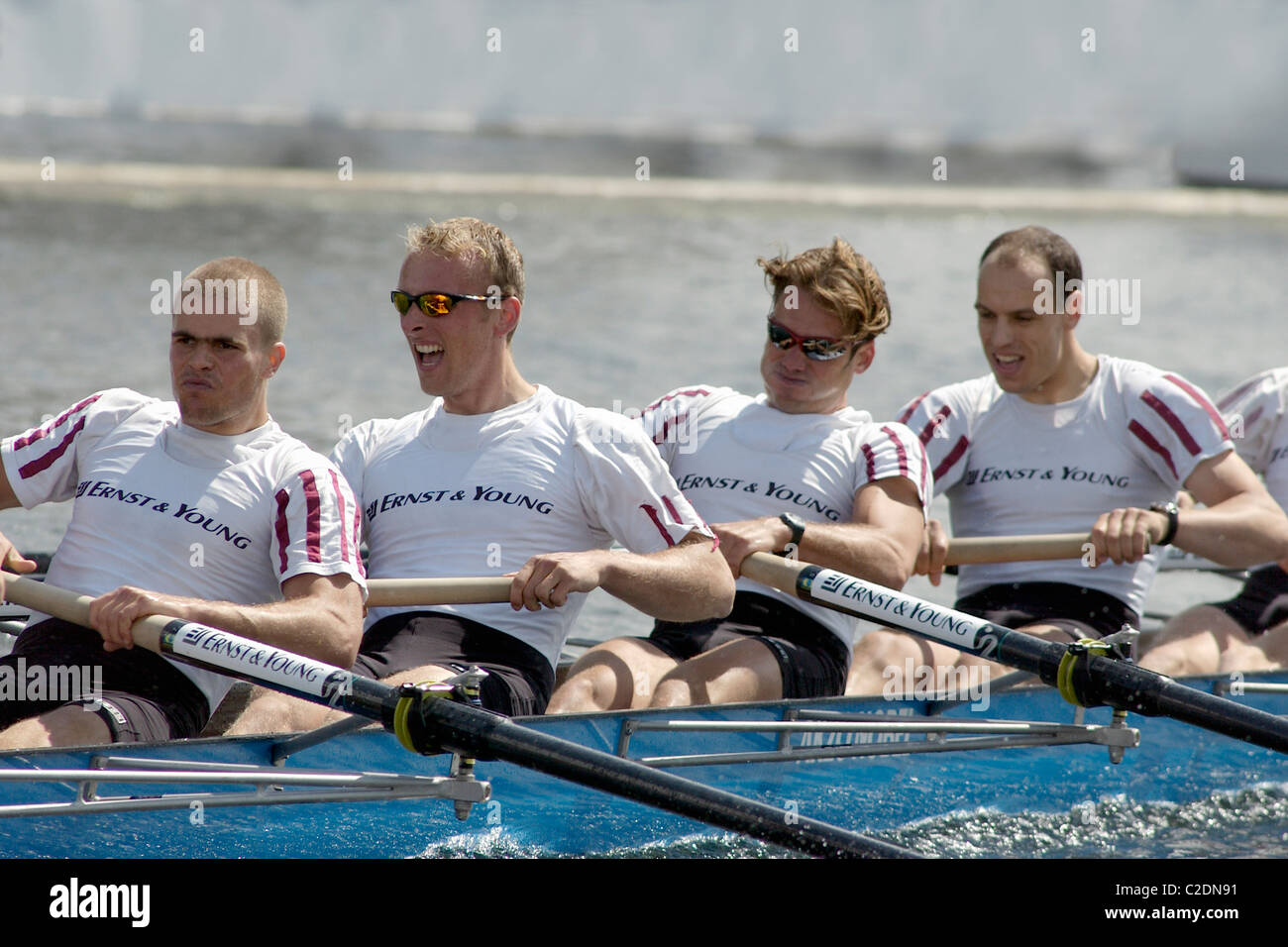 Men rowing during Henley Royal Regatta week at Henley on Thames in Oxfordshire England UK Stock Photo