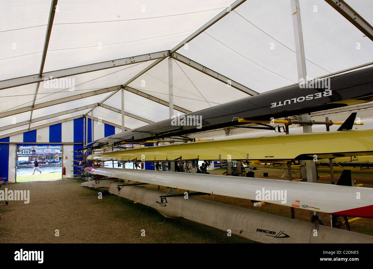 Rowing shells in the boat tent at Henley Royal Regatta week at Henley on Thames in Oxfordshire England UK Stock Photo