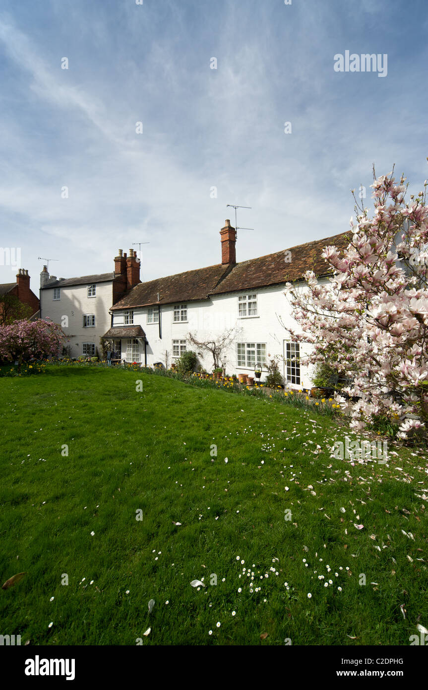 Property overlooking St. Nicholas' Church grounds, Alcester, Warwickshire, England, UK Stock