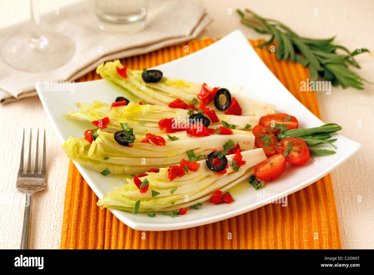 Endives with tarragon vinaigrette. Recipe available Stock Photo Alamy