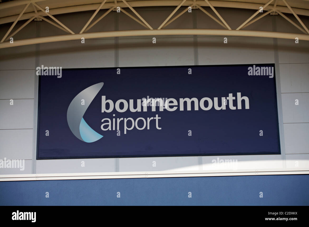 Bournemouth Airport sign on entrance to departures at Bournemouth, Dorset, UK in April Stock Photo