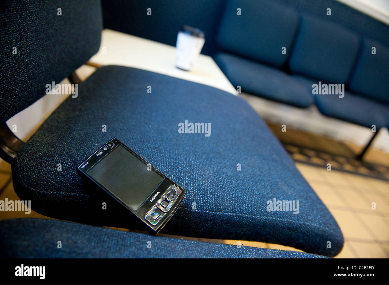Nokia mobile phone accidentally left in a waiting room. Stock Photo