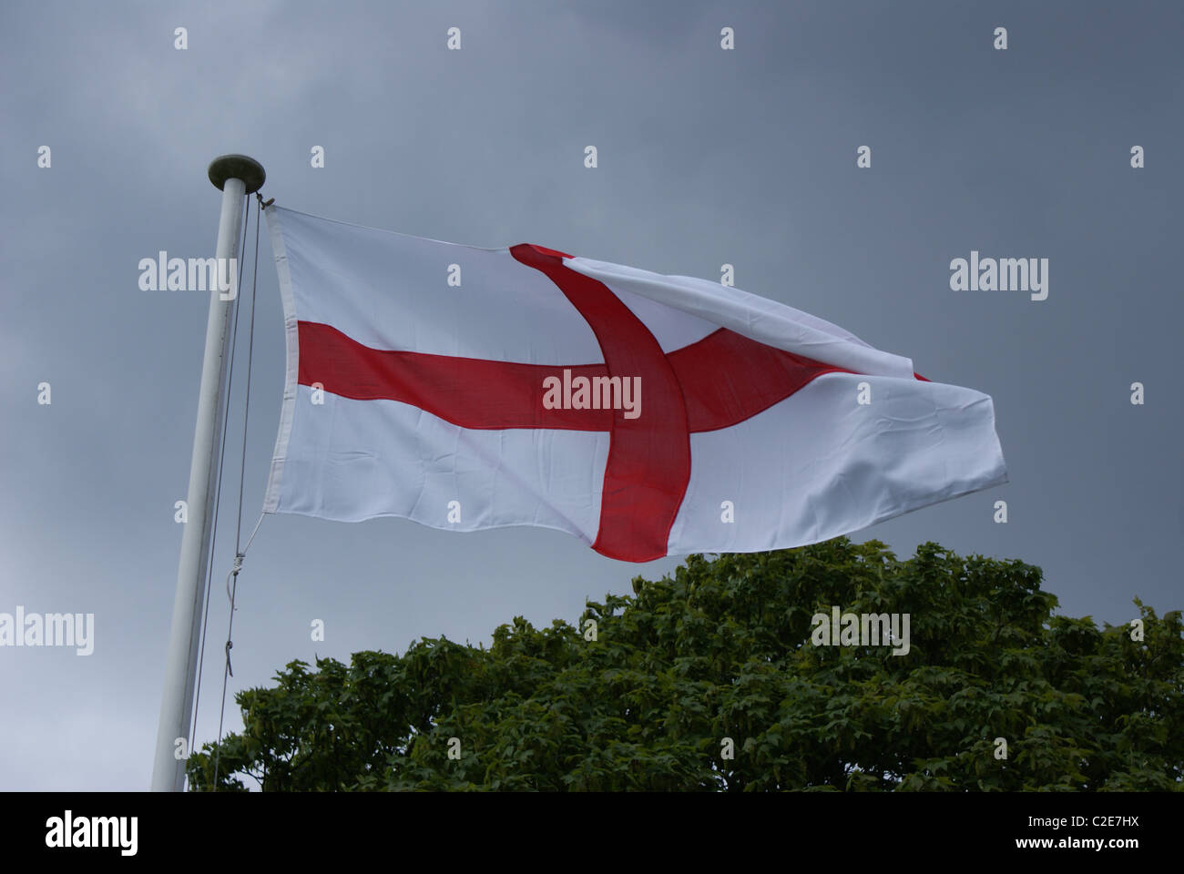 St George's flag blowing in the wind Stock Photo - Alamy