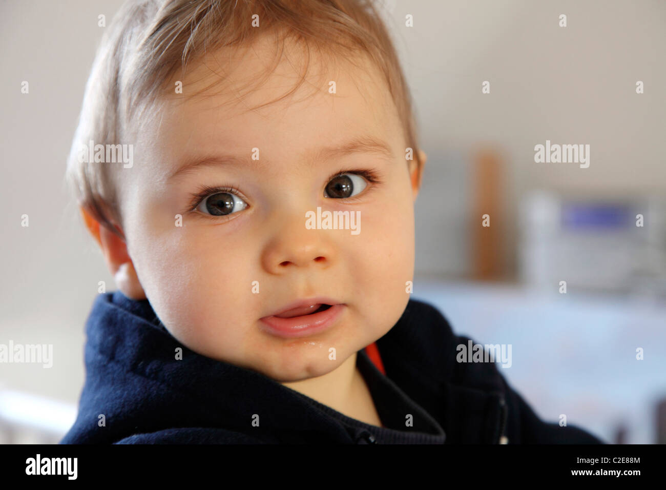 Little boy, baby, 10 month old, looking friendly. Stock Photo