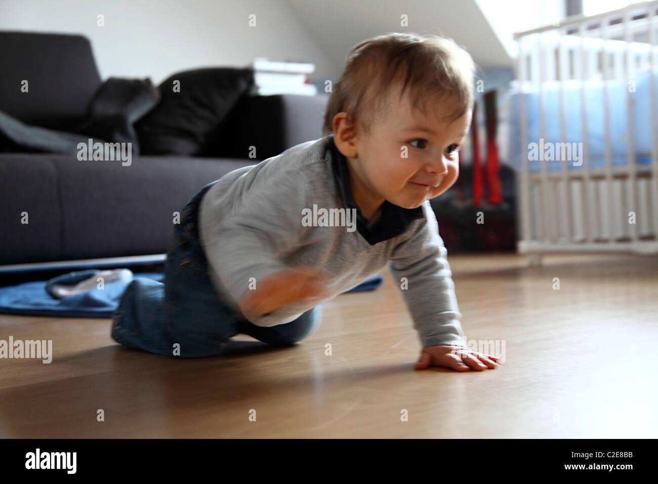 Little Boy Baby 10 Month Old Is Exploring His Home Apartment Looking Curious At Everything Stock Photo Alamy