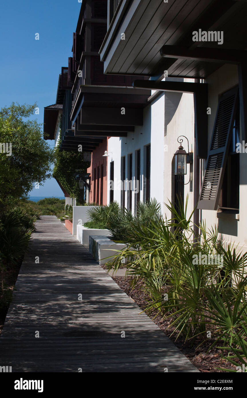 A view down a boardwalk towards the Gulf of Mexico in Rosemary Beach, FL. Stock Photo