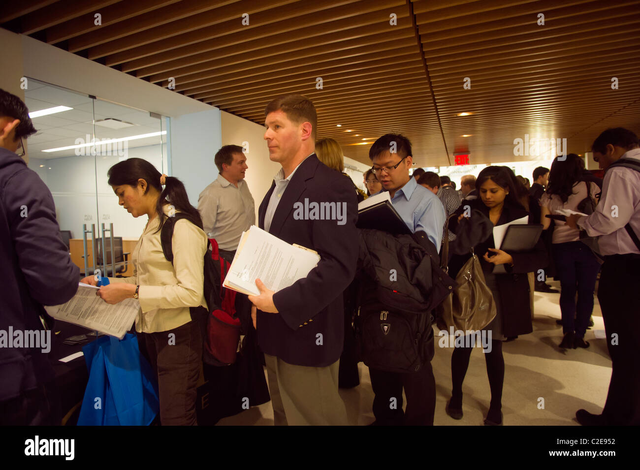 Job seekers attend a job fair in New York Stock Photo