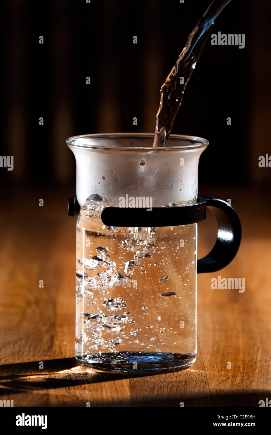 Cup being filled with water hi-res stock photography and images - Alamy