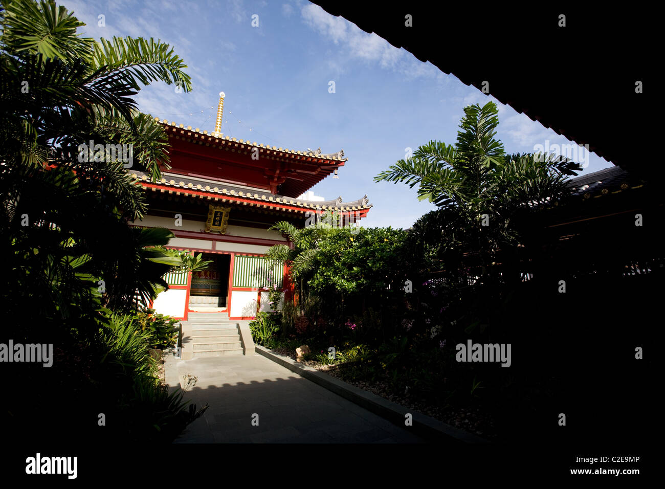 A buddhist temple with a garden and shade Stock Photo