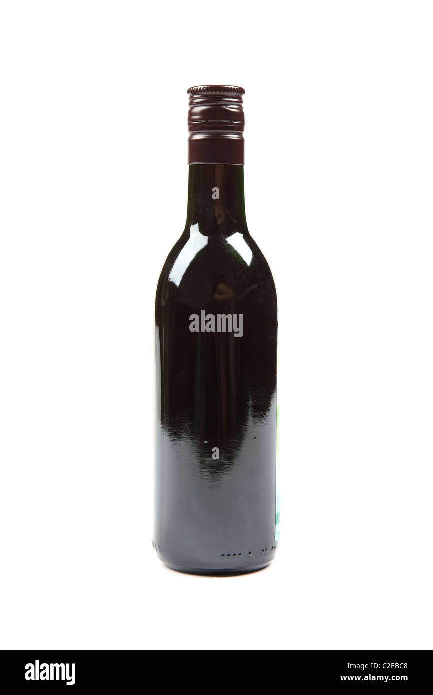 Small size full bottle of red wine isolated on white background. Stock Photo