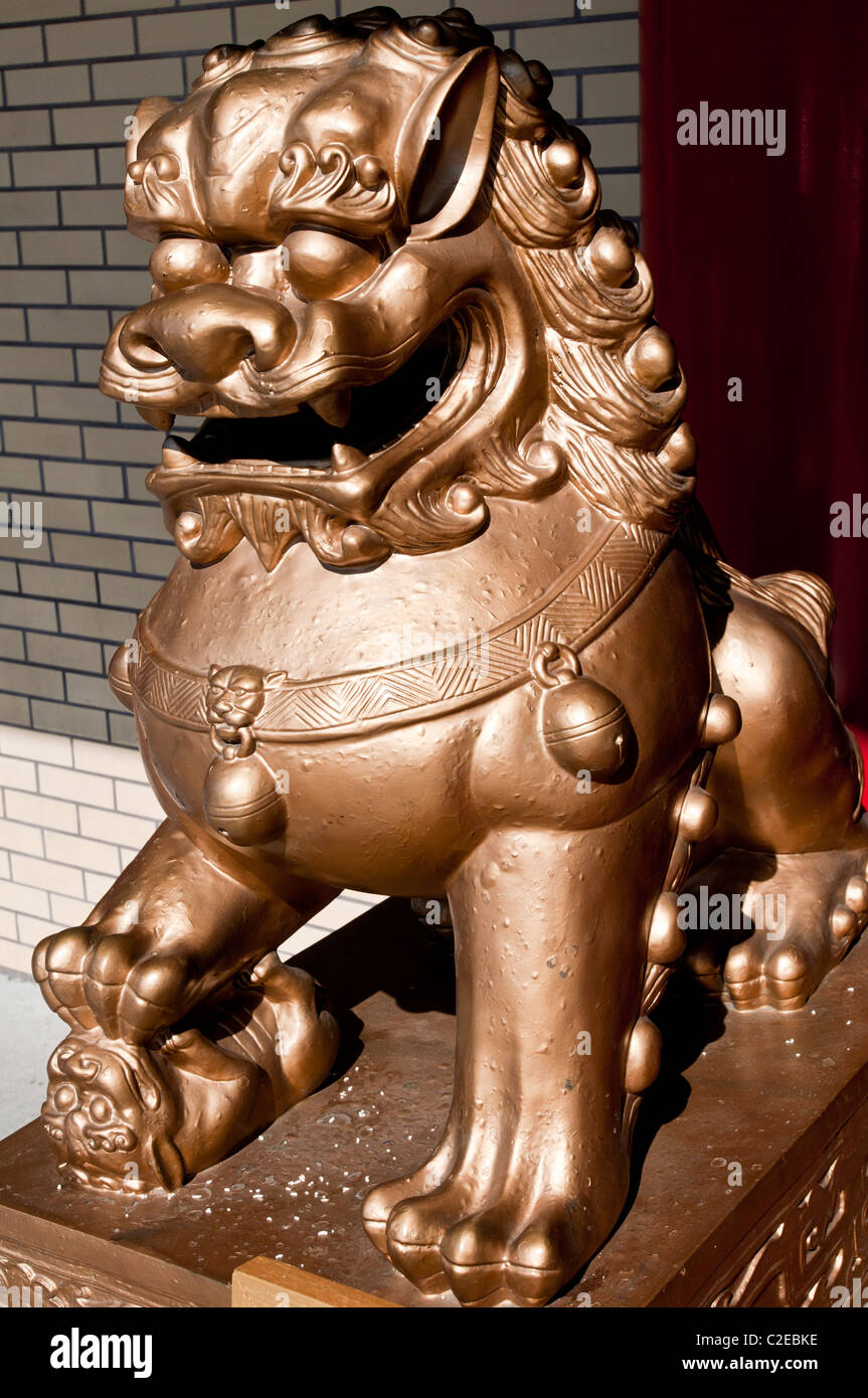 Metal lion guardian statue in Chinese Mahayana Buddhist Temple, Chinatown, Manhattan, New York City, USA, Buddhism, religion, cu Stock Photo